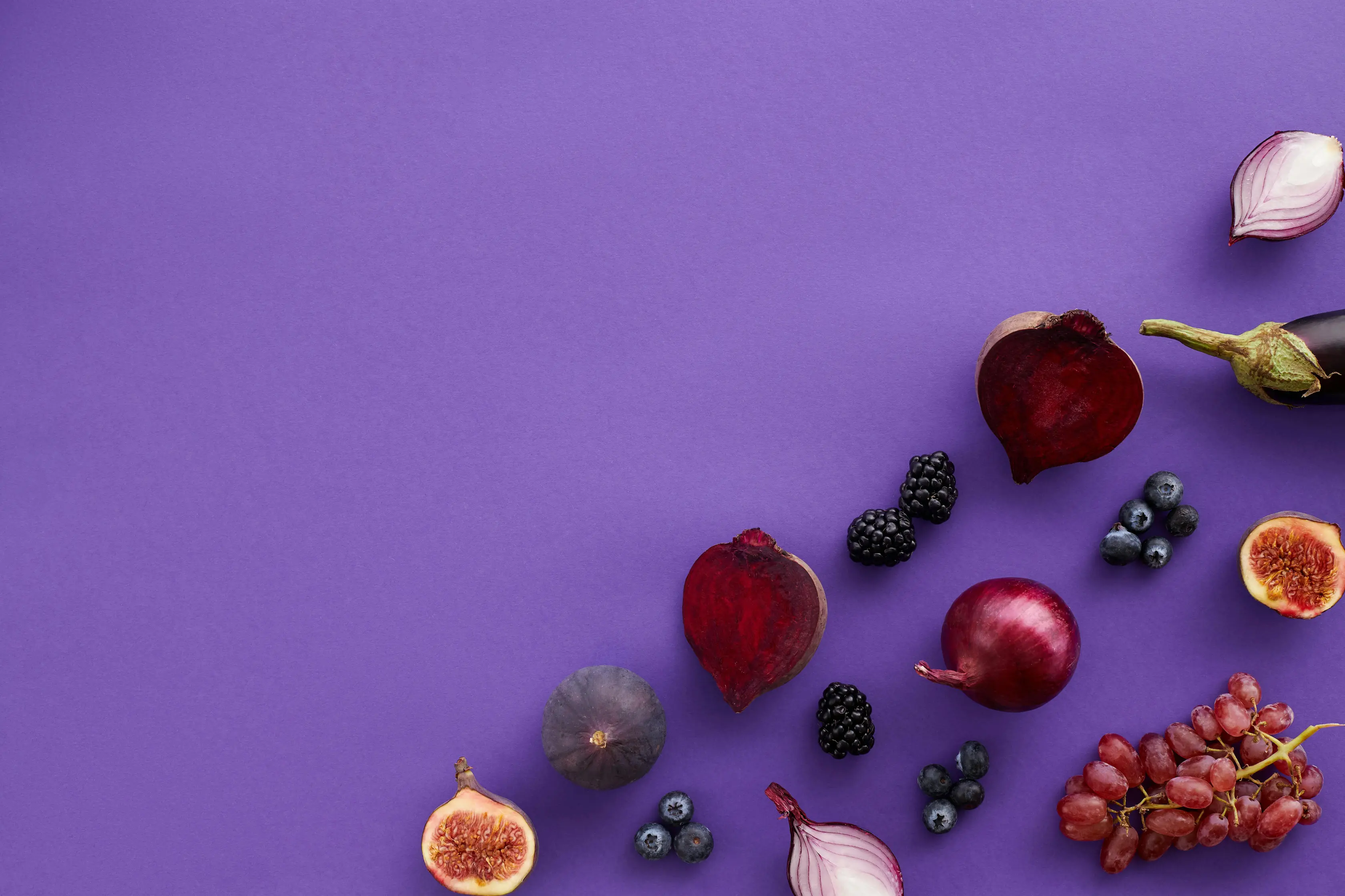 Fresh purple vegetables and berries